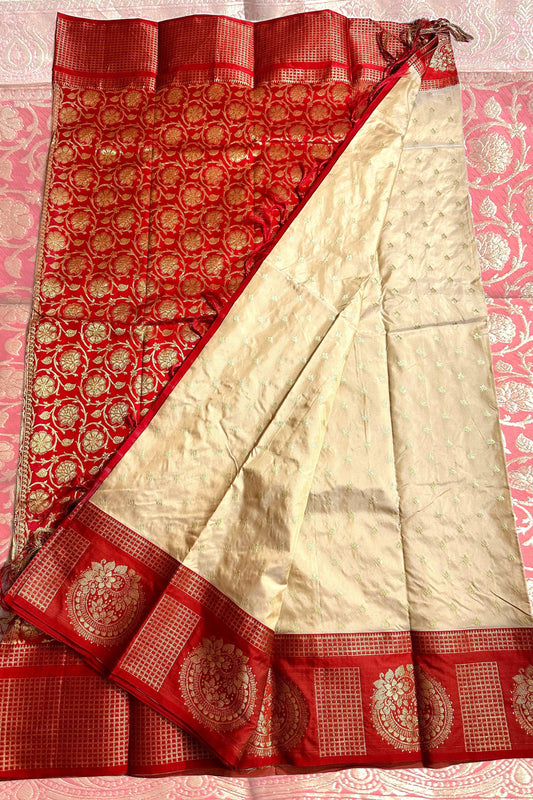 Off White Kanjivaram with Red base and Golden Zari weaving Pallu